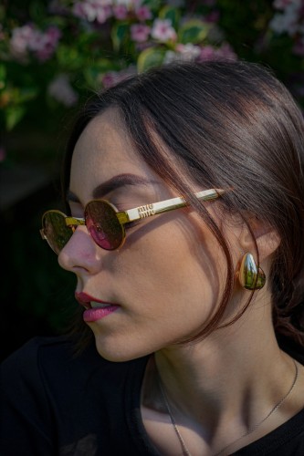 MIU MIU MU B51S - 7OE30Y - 47 Sonnenbrillen Bronze Oval